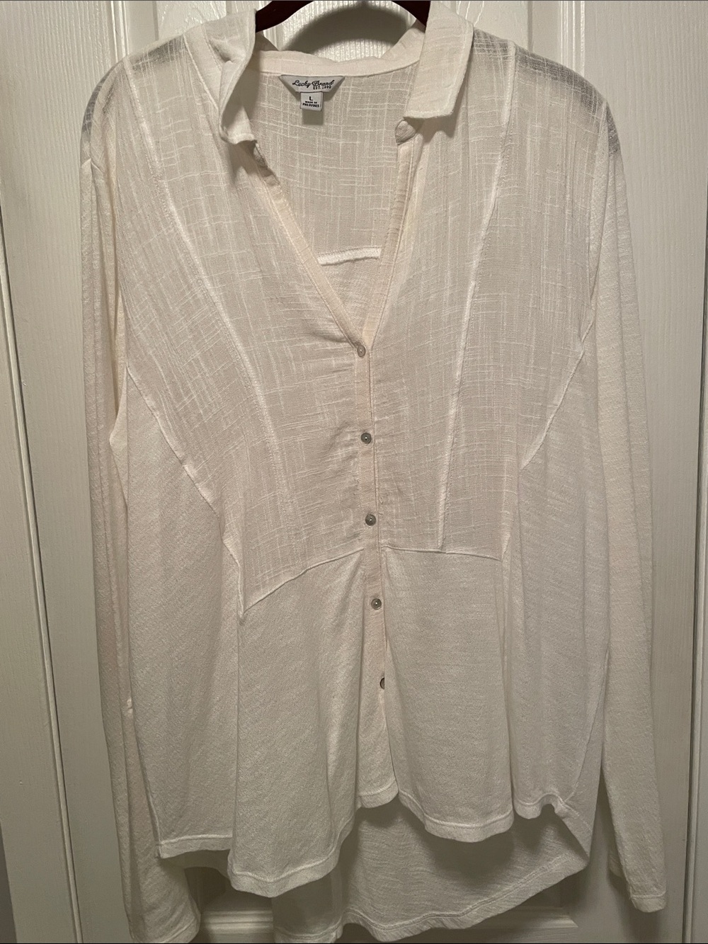 Women’s size large button down top by Lucky brand